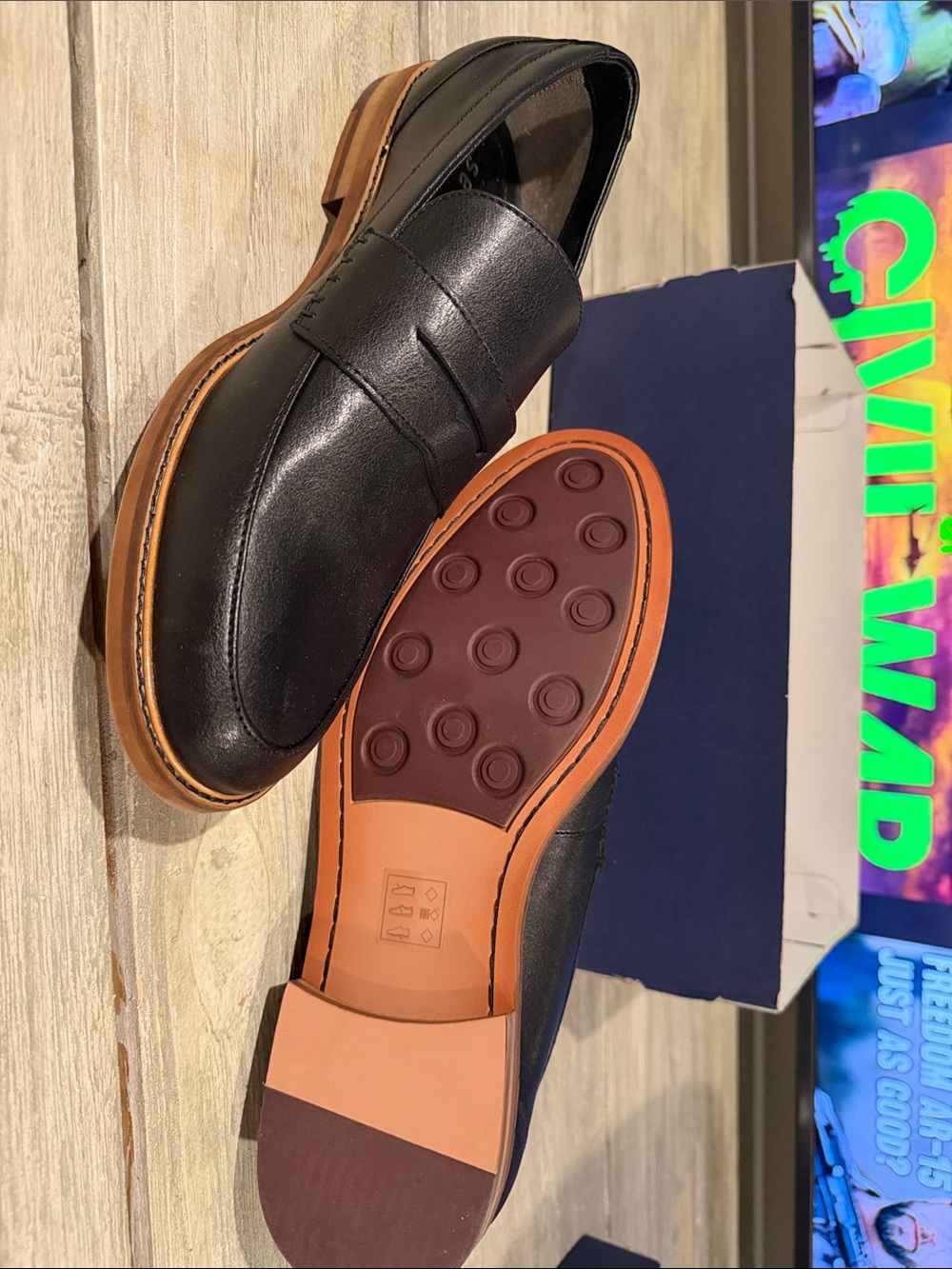 Men's Black Leather Penny Loafers with Contrast Sole